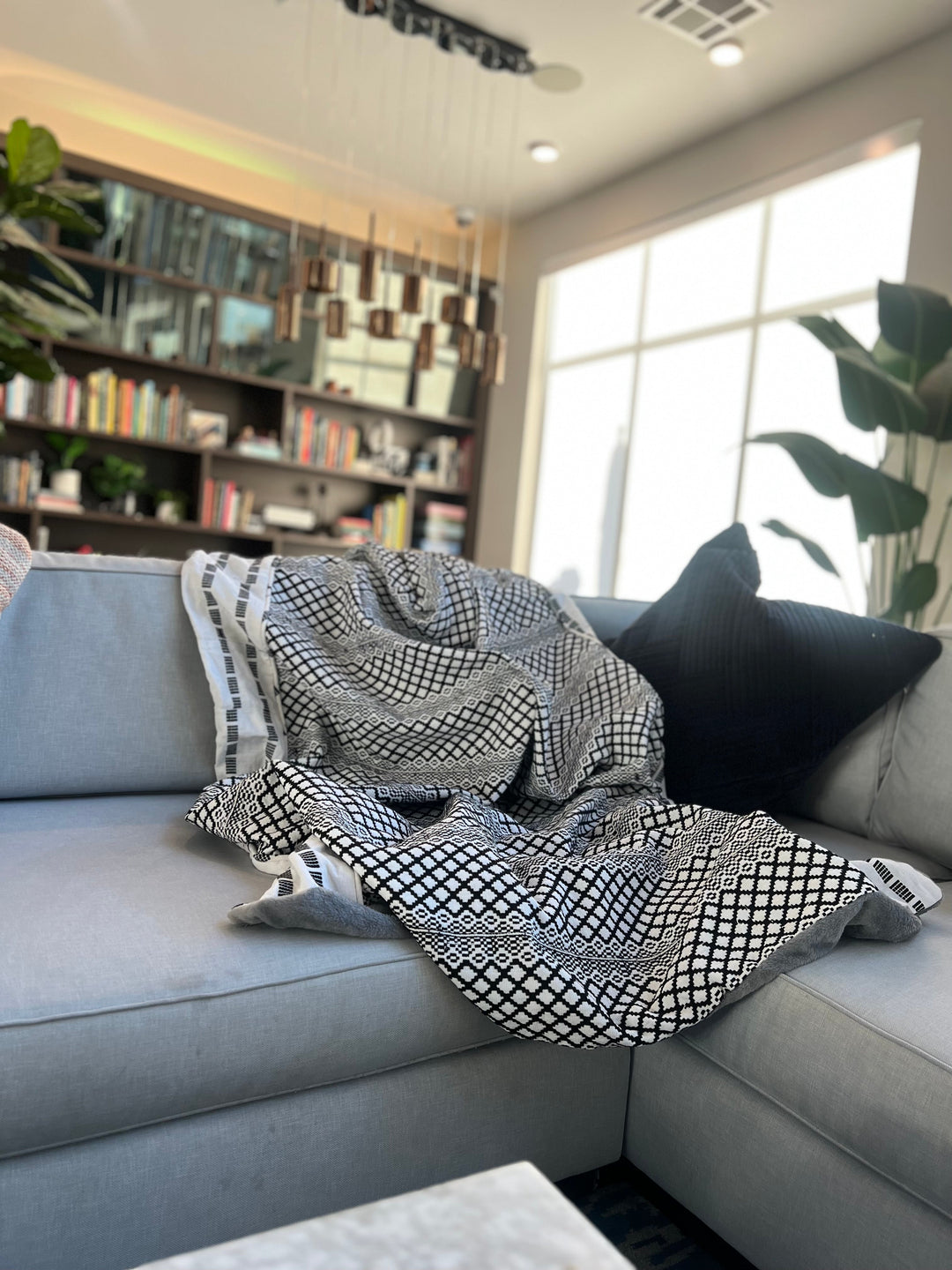 Artisan-made Kente throw blanket from Obrempong Home, showcasing ethnic African home furnishings and Kente patterned bed linens