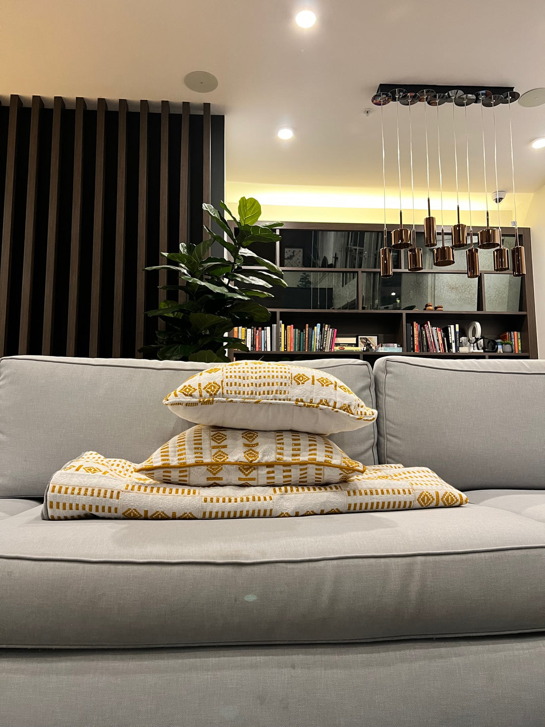 Embrace Tradition and Luxury with Handwoven Kente Blankets and Pillows by Obrempong Home