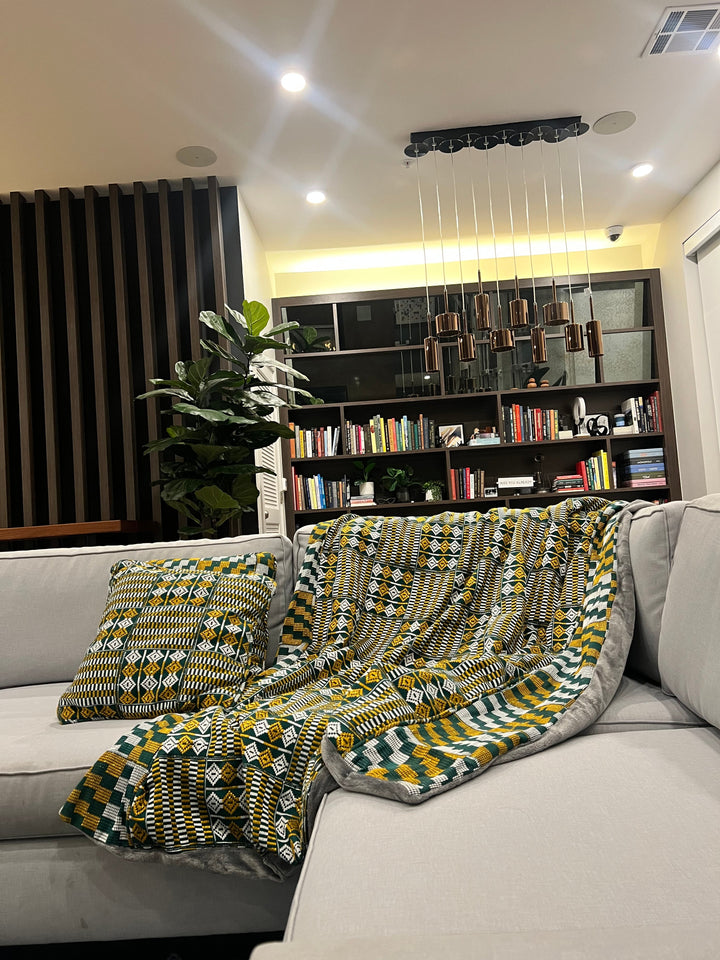 Authentic Kente textile throw blanket in rich, handwoven fabric - the essence of African-inspired home decor