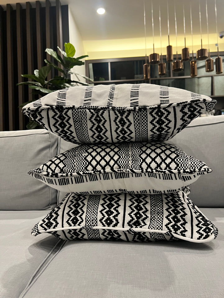 Authentic Kente fabric throw pillow from Obrempong Home, an artisan-crafted addition to ethnic Kente bed covers and vibrant Kente patterns