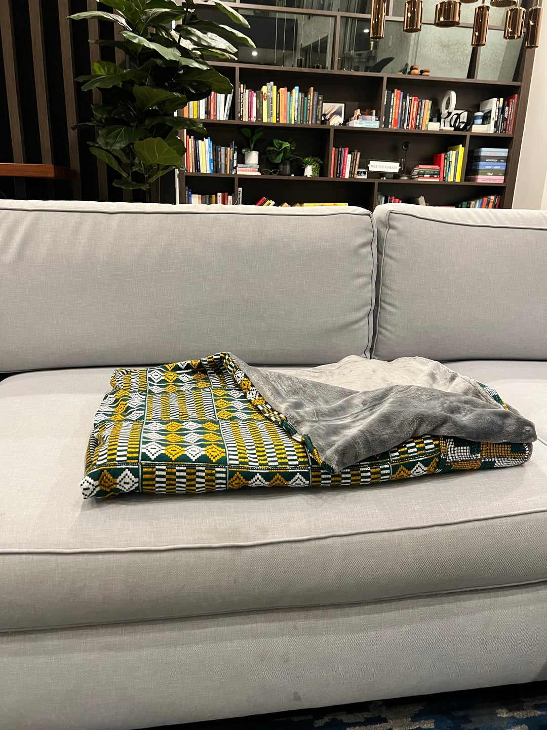 Traditional Kente cloth blanket, perfect for elevating Kente patterned bed linens and cultural Kente accessories in your living space from Obrempong Home