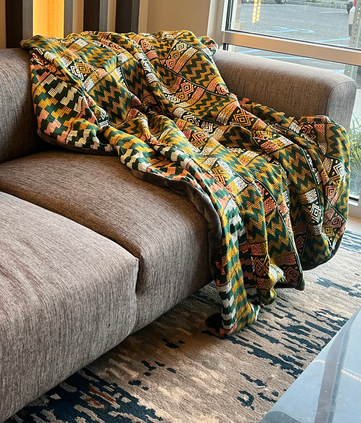 Versatile and stylish, our Kente blankets can effortlessly elevate any space.