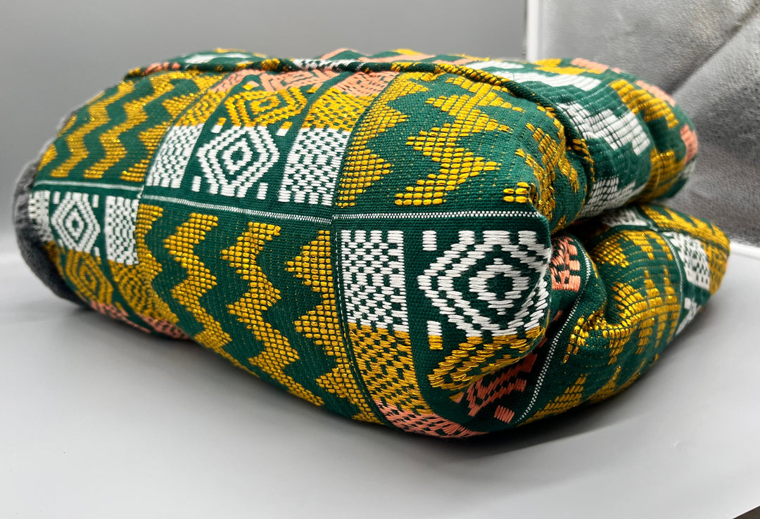 Experience the beauty and craftsmanship of our handmade Kente blankets today and infuse your living space