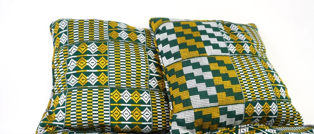 Handwoven Kente throw pillow featuring vibrant Kente patterns - an exquisite accent for luxury Kente bedding