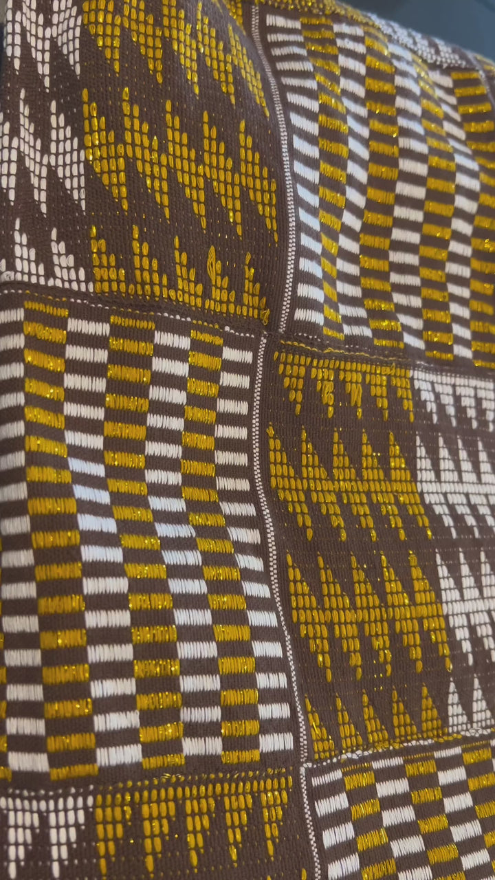 "Premium Ghanaian kente bedspread featuring rich blue and white weaving"